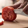 ZWILLING Gourmet 5-inch Z15.1 Utility Knife, Serrated Edge Traditional, triple-riveted handle with a laser-inscribed logo provides balance and stability.