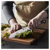 ZWILLING Pro 7-inch, Hollow Edge Slim Santoku Knife Designed to be an extension of your hand encouraging cutting with improved precision, safety and comfort.