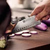 ZWILLING Pro 7-inch, Hollow Edge Santoku Knife Designed to be an extension of your hand encouraging cutting with improved precision, safety and comfort.