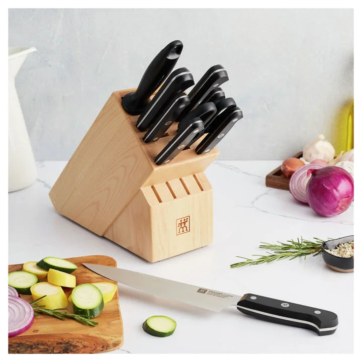ZWILLING Gourmet 10-pc, Knife block set, Natural Traditional, triple-riveted handle with a laser-inscribed logo provides balance and stability.